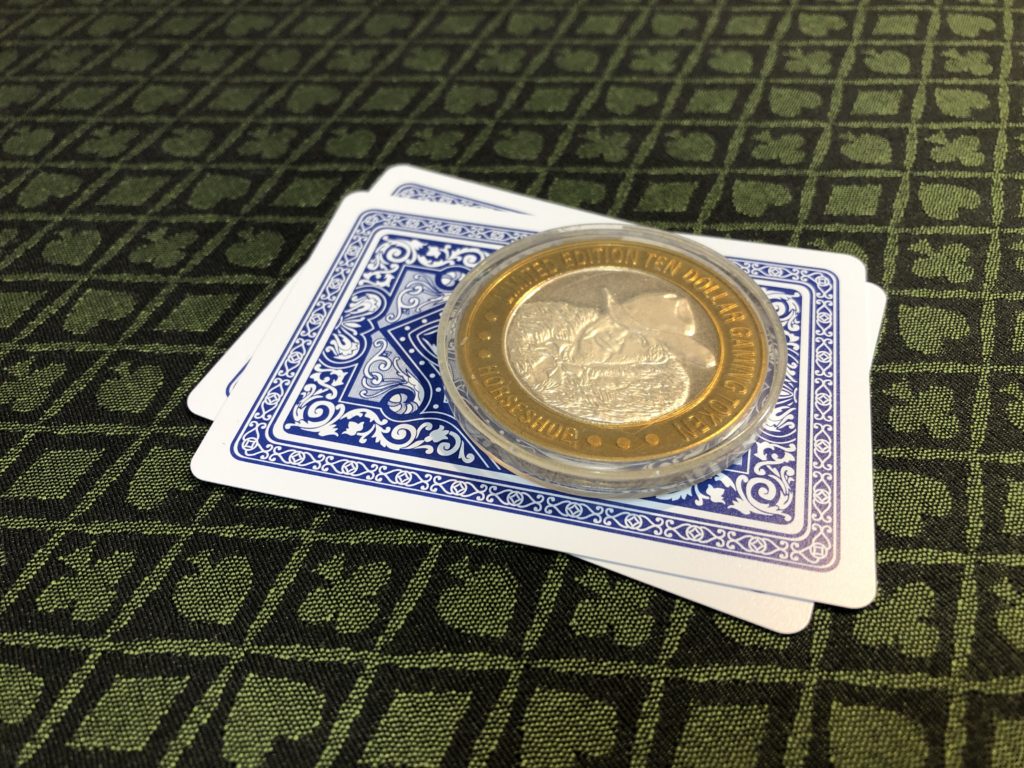 Card protectors on a poker table